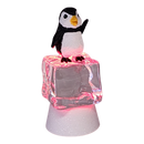 Penguin Sitting on Color-changing Lighted Icecube -
