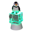 Penguin Sitting on Color-changing Lighted Icecube -