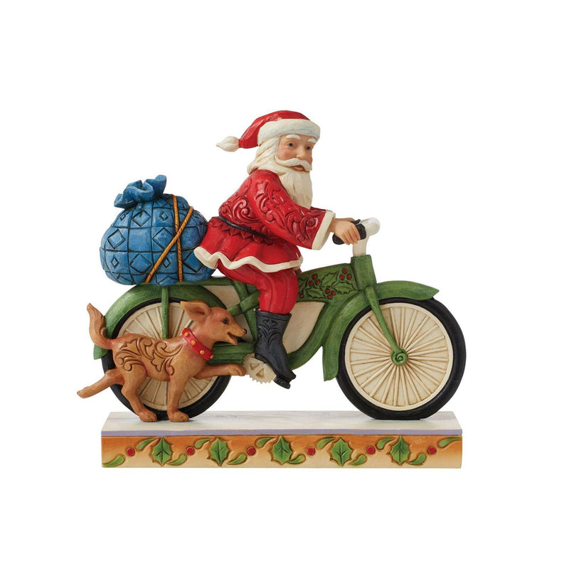 Santa Riding a Bicycle Figurine