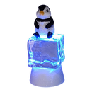 Penguin Sitting on Color-changing Lighted Icecube -