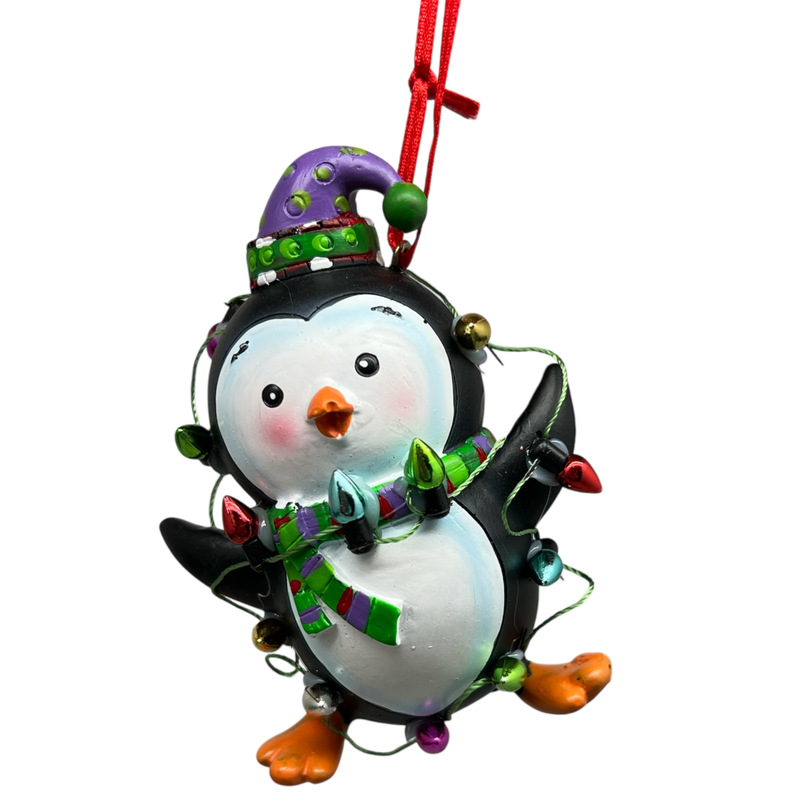 Festive Penguin With Holiday Lights and Purple Hat