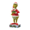 The Grinch's Heart-Warming Snow Globe: A Tender Moment with Max