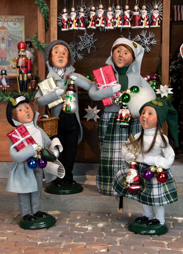 Glass Ornament Seller Caroling Family - - The Country Christmas Loft