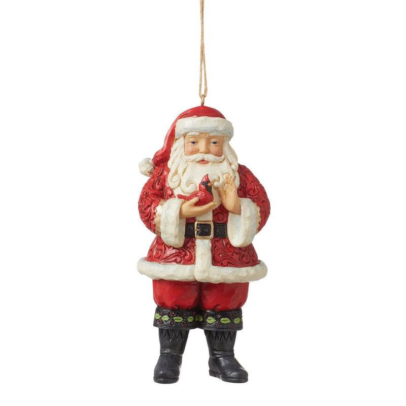 Santa Holding A Cardinal Ornament
